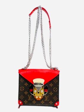 Authentic Louis Vuitton Tribal mask chained shoulder bag